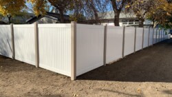 Clay posts with White rails and pickets