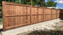 Wood Fence On Concrete Retaining Wall